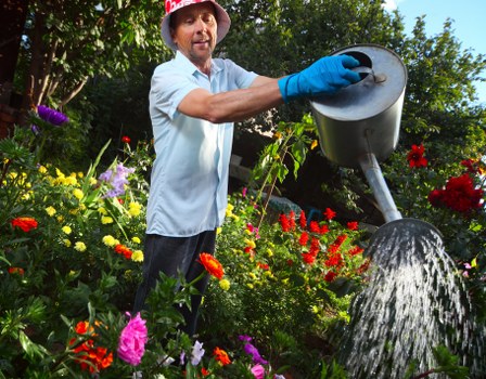 Gardener Whitechapel working on a beautifully landscaped garden